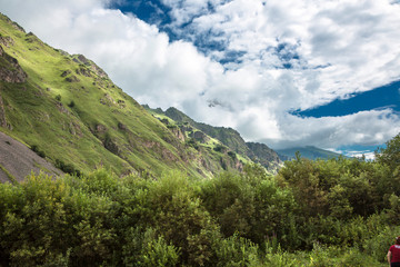 Mountains of the North Caucasus, mountain tops in clouds. Wild nature