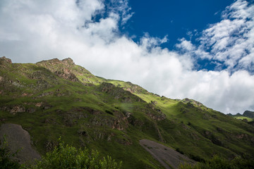 Mountains of the North Caucasus, mountain tops in clouds. Wild nature