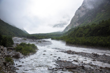 The mountain river in the beautiful gorge. The wild nature in mountains of the North Caucasus