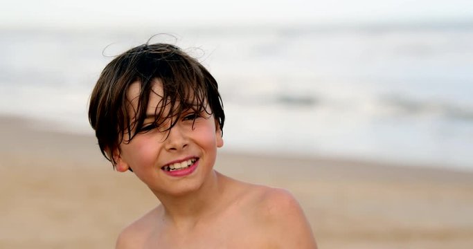 Portrait of young boy at the beach