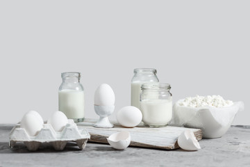 Fototapeta na wymiar Fresh dairy and fermented milk products. Eggs On a white background.