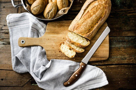 Sliced ciabatta on wooden board