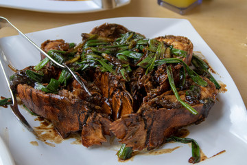 Black pepper crayfish, a popular dish in seafood restaurants, Singapore