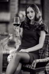 Girl with a glass of wine
