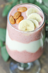 strawberry smoothie or strawberry yogurt with banana topping