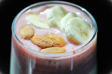 strawberry smoothie or strawberry yogurt with banana topping