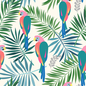 Seamless repeat pattern with tropical leaves and colorful ara parrots in sophisticated colors