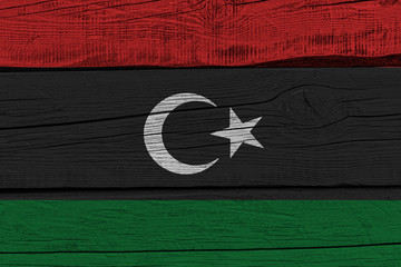 libya flag painted on old wood plank