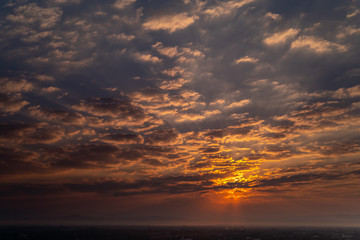 Sunset over buildings in center of Chiang Mai, Thailand. Colorful Sunset with CityScape.