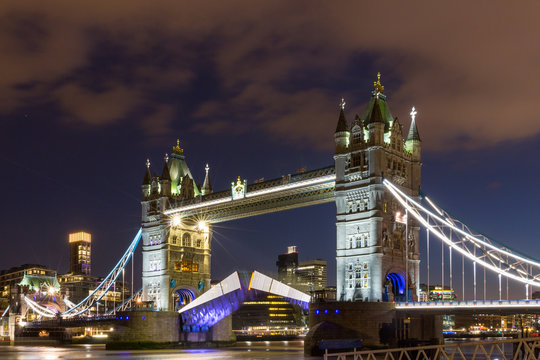 Tower Bridge Raised To Let Ship Pass Through. London, England