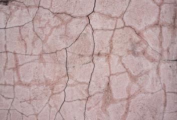 A lot of cracks on the concrete wall texture