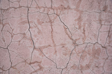 A lot of cracks on the concrete wall texture