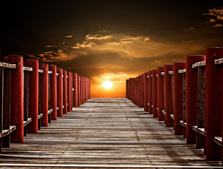 Wooden bridge and sun