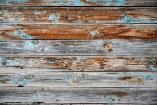Wooden texture with old peeling paint blue