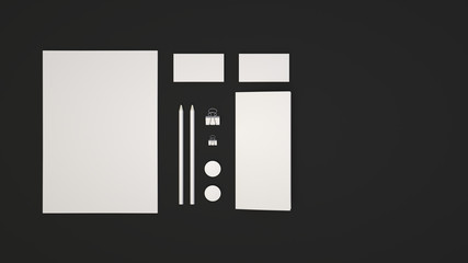 Sheet of paper, business cards, binder clips, badges and pencils