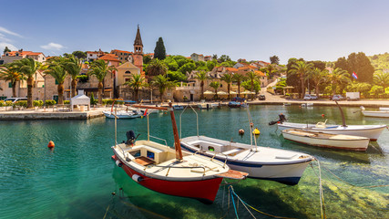 Fishing boats in Splitska village with beautiful port, Brac island, Croatia. Village of Splitska on...