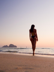 walking on the beach at sunset