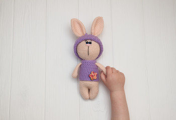 Fototapeta na wymiar soft funny crochet bunny