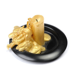 Old golden wax candle