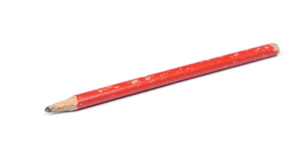 Old used red nibbled pencil