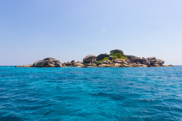 Fototapeta premium Similan Islands as a tourist destination featured in the beauty under the sea. the boat to take tourists snorkeling around the island.