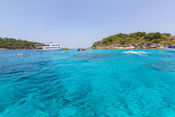 Similan Islands as a tourist destination featured in the beauty under the sea.   the boat to take tourists snorkeling around the island.