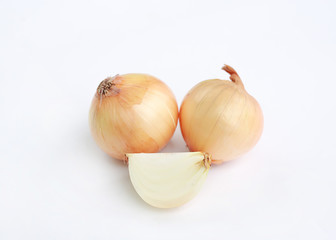 Fresh onion bulbs isolated on white background