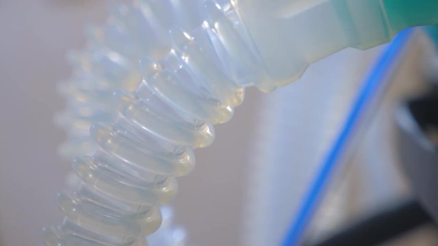 Oxygen mask. Tube for supplying oxygen for patient. First-aid equipment. Modern hospital equipment. Medical equipment background.