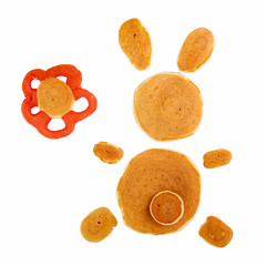 Funny bunny pancakes Isolated on white. Creative breakfast for kids, Easter pancakes. Top view, close-up.