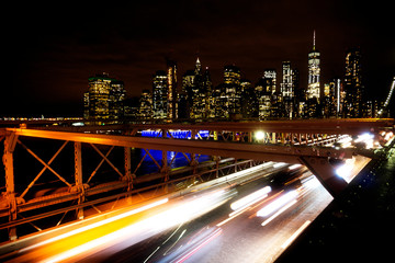 Fototapeta na wymiar Car traffic on Brooklyn Bridge in New York - USA