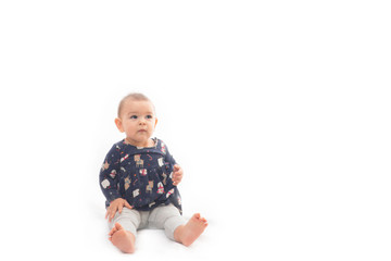 Portrait of a smilling baby girl smiling isolated on a white background childhood