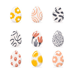 Set of Easter eggs in pastel colors with different patterns. Festive vector icons isolated from white background