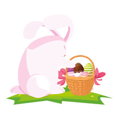 cute rabbit easter with eggs painted in basket