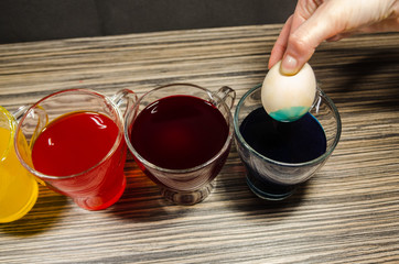 cups with colored water for easter