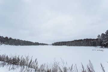The frozen lake in winter