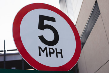 Speed 5 mph sign. Five miles per hour traffic sign. - 256368325