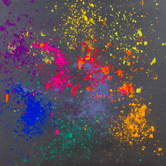 Indian holi dyes powder on a black background. Holi festival colors