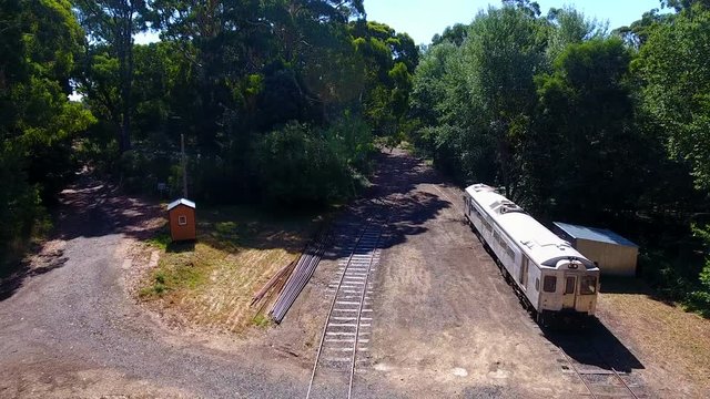 Aerial of train arriving at station