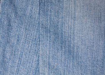 Texture of blue jeans textile close up