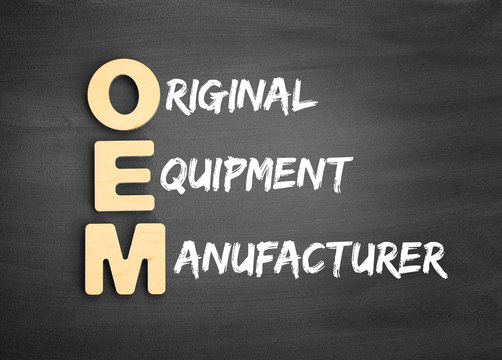 Wooden alphabets building the word OEM - Original Equipment Manufacturer acronym on blackboard