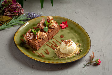 hazelnut brownie with chocolate petals and ice cream