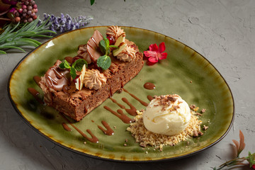 hazelnut brownie with chocolate petals and ice cream