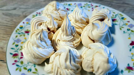 Meringues or spumini, a dessert made from egg whites and sugar, typical of Italian cuisine