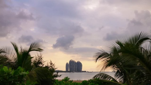 sunset time sanya city famous hotel resort island beach bay panorama 4k timelapse hainan china