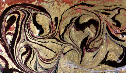 Gold, bronze and black marbling pattern. Golden marble liquid texture.