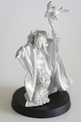 Shaman with stick - tin figure.