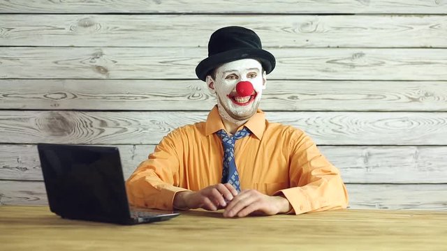 Clown businessman working in the office