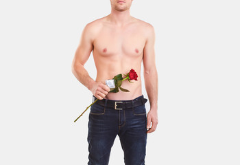 Male lover with a condom and a rose in his hand.
