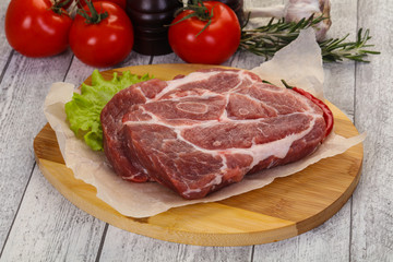 Raw pork neck steak