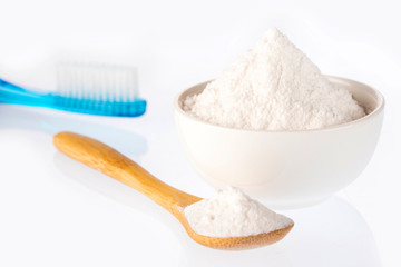 Fototapeta na wymiar Toothbrush with baking - White background